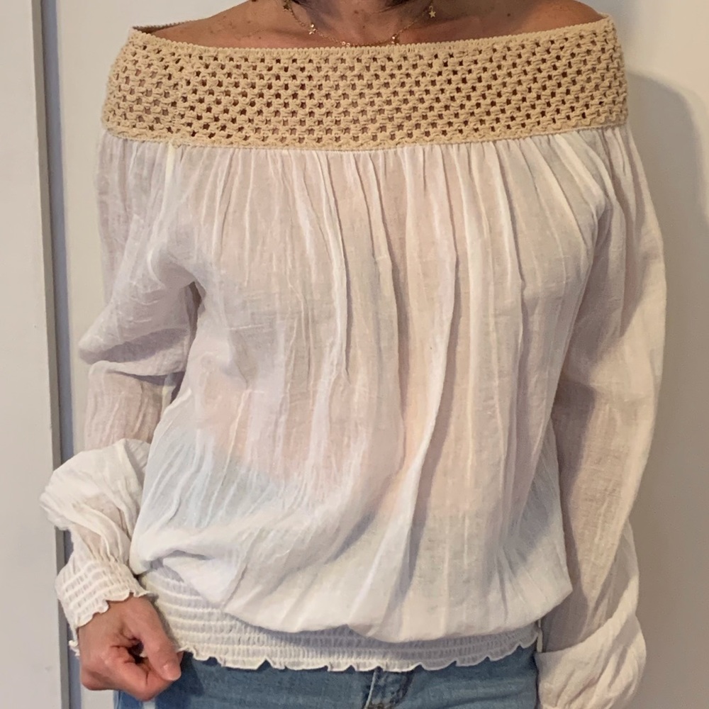 White off the shoulder shirt.